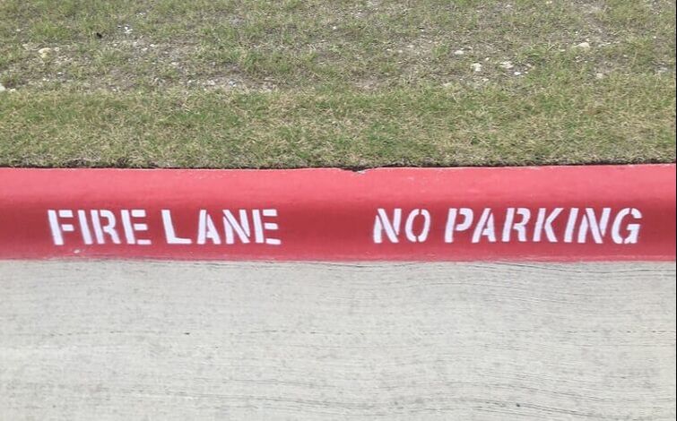 Fire lane striping on your curb in Mobile, Alabama